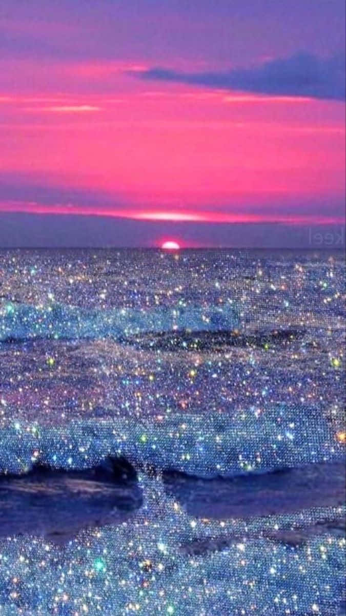  Schwarz Glitzer Hintergrundbild 675x1200. Download A Sunset With Glitter On The Ocean Wallpaper