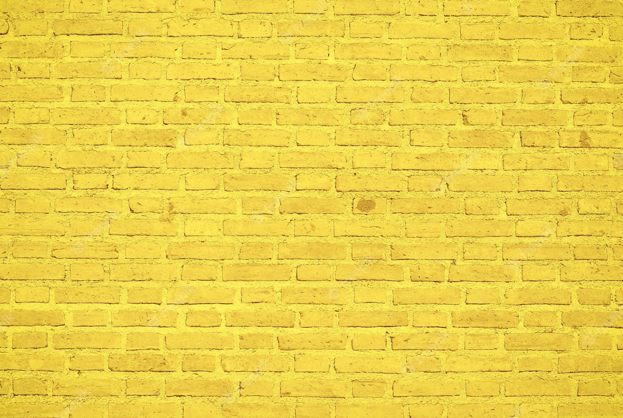  Ziegel Hintergrundbild 2000x1343. Yellow Wall Bilder Download auf Freepik