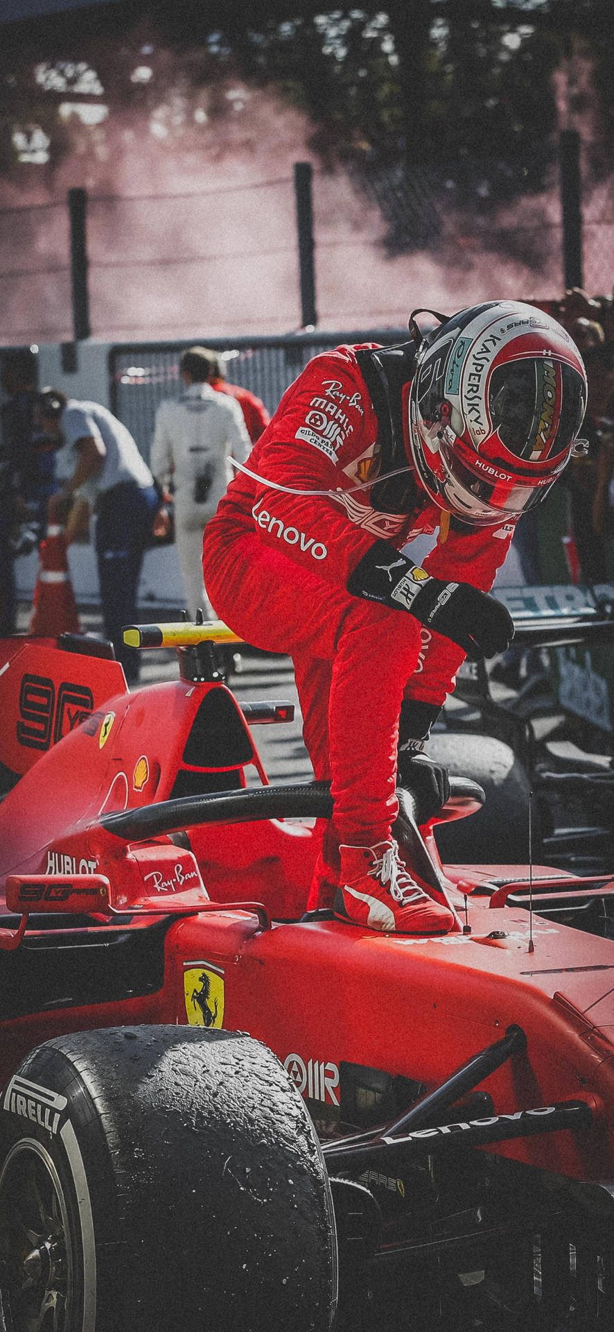  F1 Hintergrundbild 886x1920. Download Action shot of F1 Driver Charles Leclerc Exiting His Racing Car Wallpaper