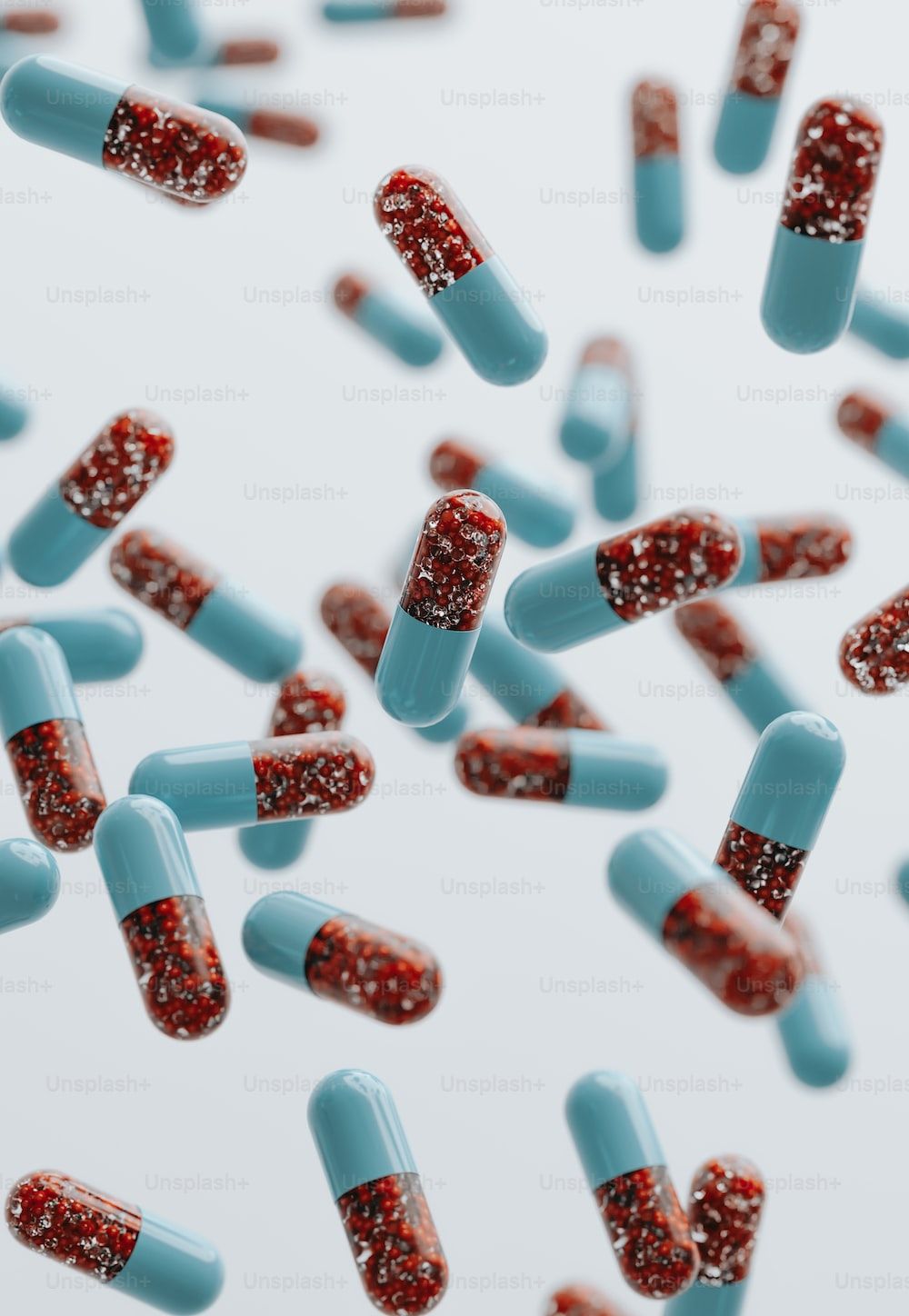  Medizin Hintergrundbild 1000x1448. Foto zum Thema Viele blaue und rote pillen mit roten und weißen flocken