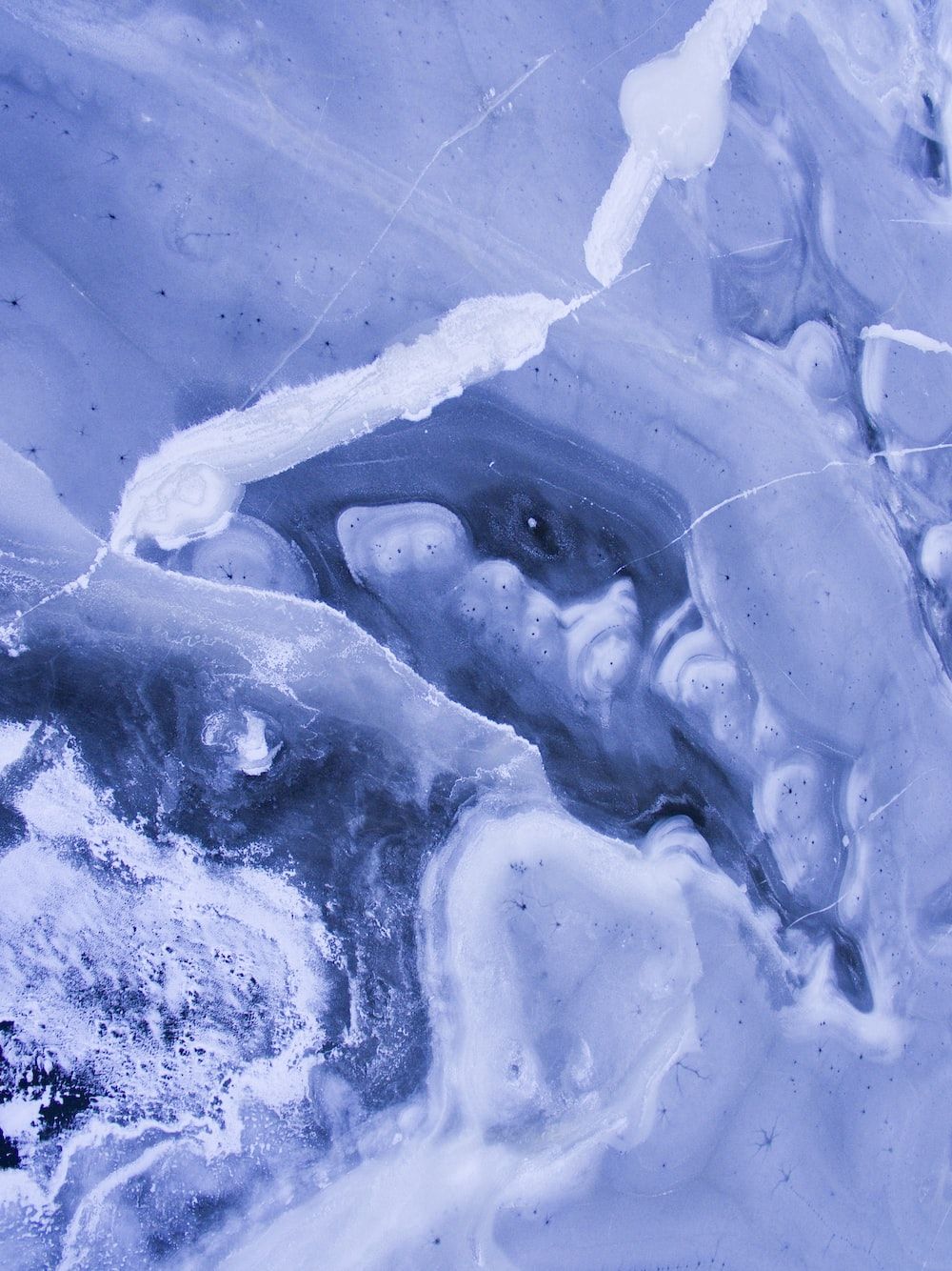  Eis Hintergrundbild 1000x1334. Foto zum Thema Eine Nahaufnahme von Eis und Wasser