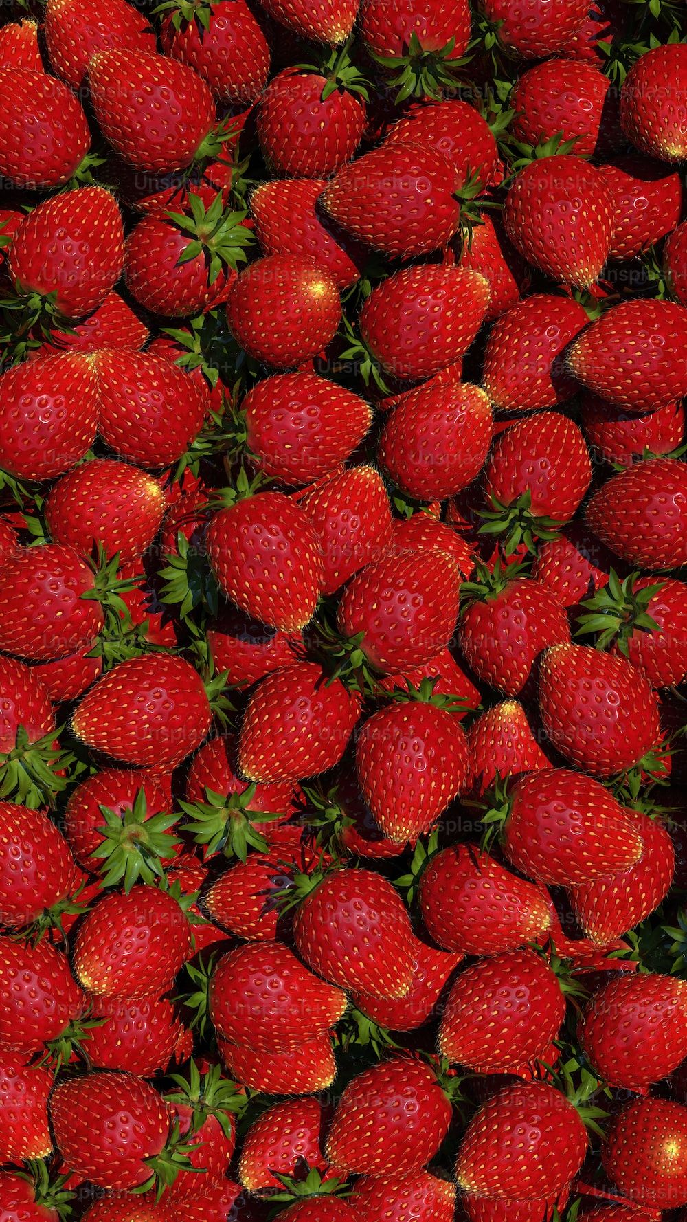  Erdbeeren Hintergrundbild 1000x1778. Foto zum Thema Nahaufnahme eines Straußes Erdbeeren