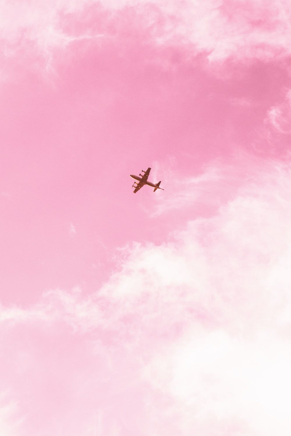  Flugzeug Hintergrundbild 1000x1500. Foto zum Thema Flugzeug am Himmel während des Tages