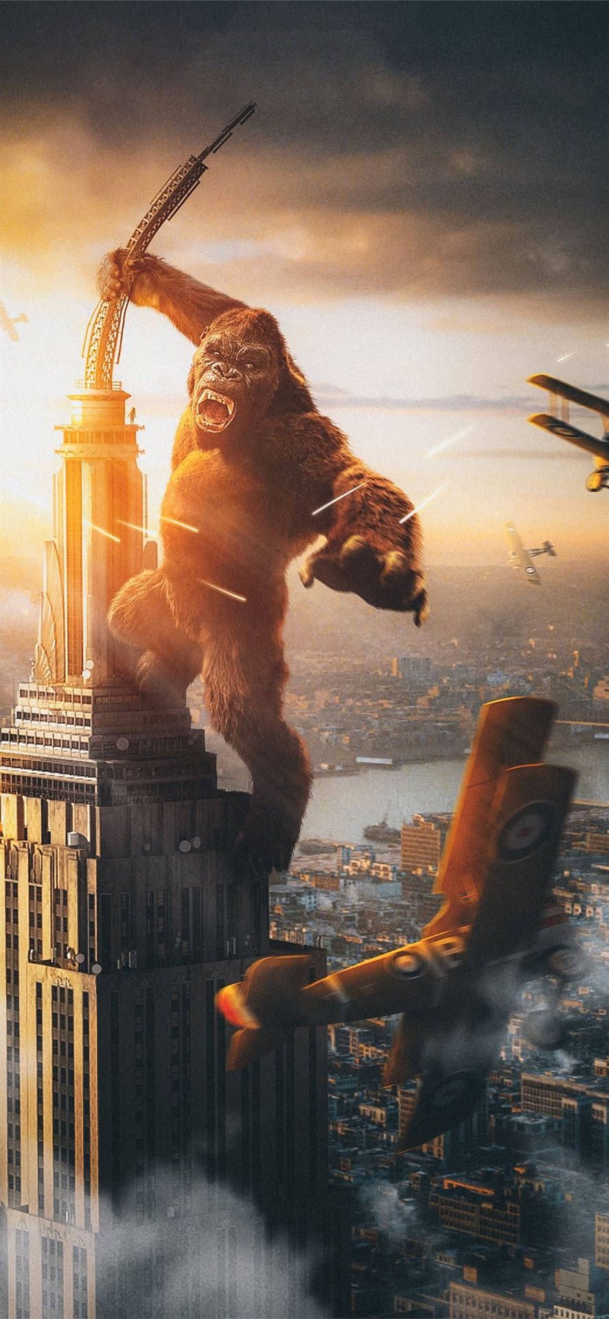  Godzilla X Kong: The New Empire Hintergrundbild 887x1920. Download Empire State Building stands resolute as Godzilla and Kong clash in an epic battle Wallpaper