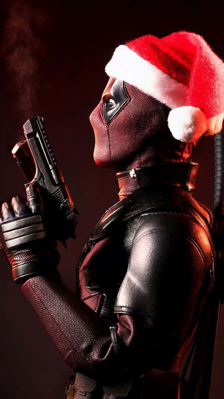  Deadpool & Wolverine Hintergrundbild 736x1309. Download Marvel Christmas Santa Deadpool Gun Wallpaper
