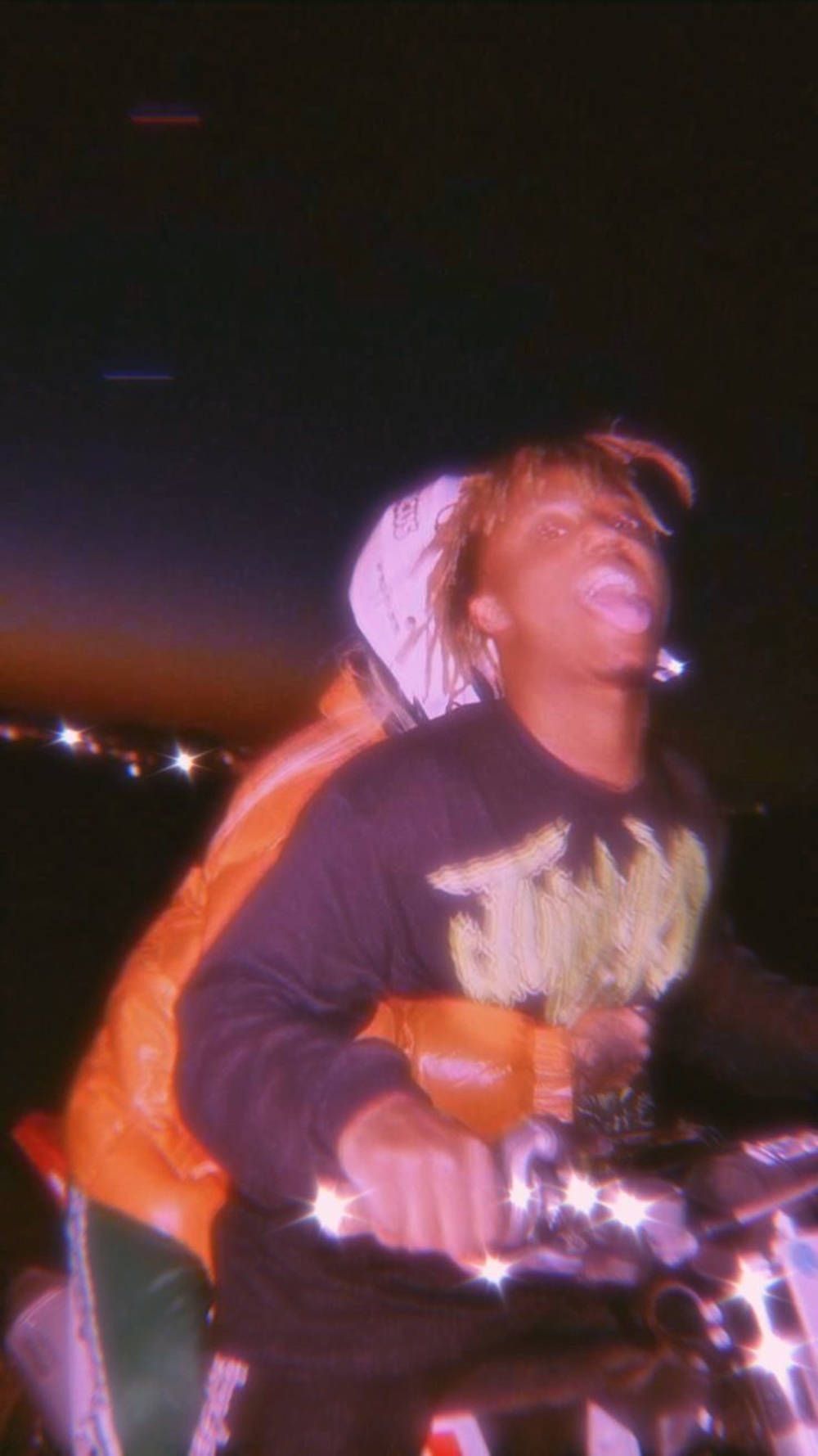  Juice Wrld Hintergrundbild 1000x1779. Download Juice WRLD at a live performance Wallpaper