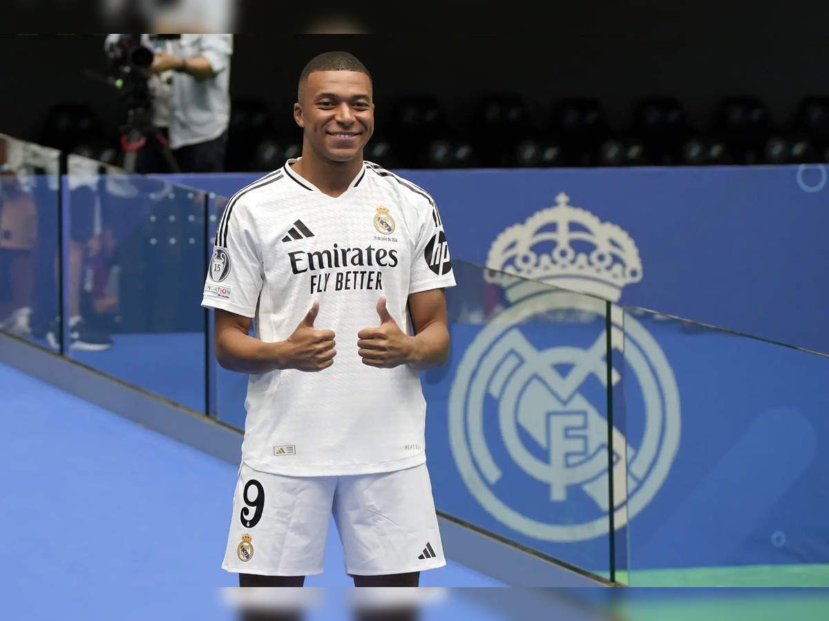  Mbappe Real Madrid Hintergrundbild 1200x898. Kylian Mbappe: Kylian Mbappe's unveiling as Real Madrid player sees 000 fans cheering for him Economic Times