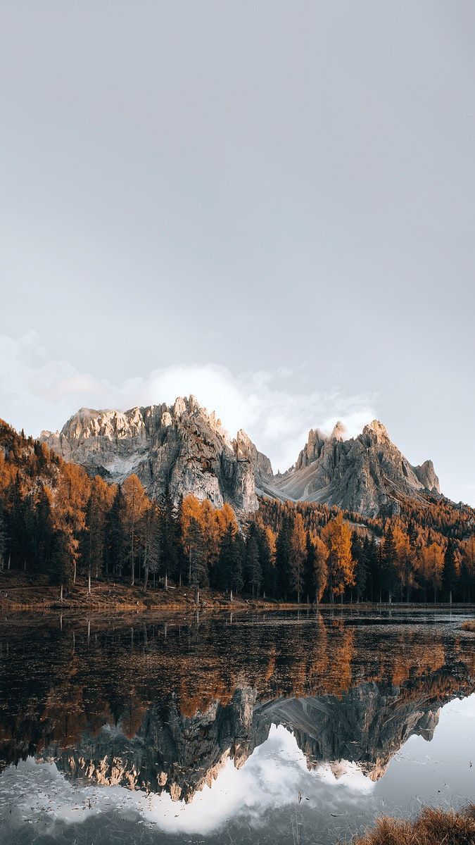  Lake Antorno Hintergrundbild 675x1200. Download premium image of Dolomites lake in autumn mobile phone wallpaper by Luke Stackpoole about iphone wallpaper autumn, iphone wallpaper, mobile wallpaper nature, italy, and nature wallpaper 2094657