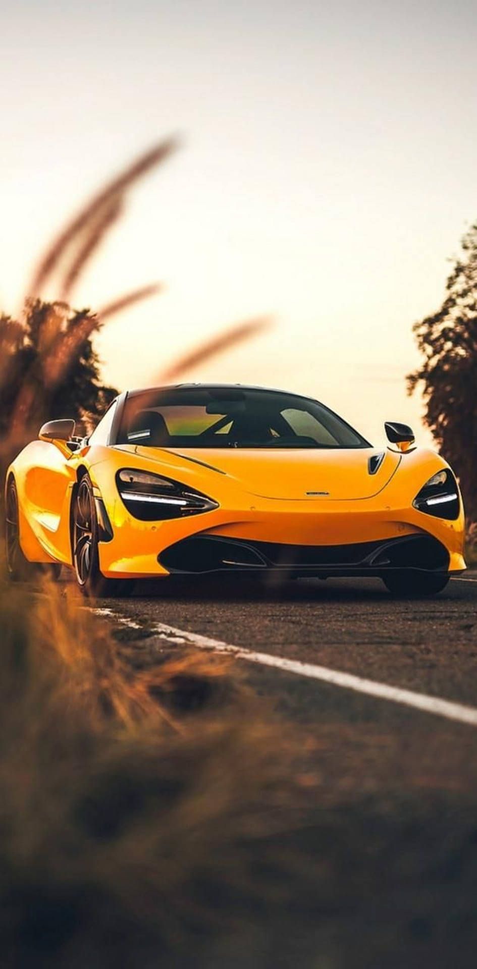  McLaren Hintergrundbild 945x1920. Download McLaren 720S Phone Yellow Aesthetic On Road Wallpaper