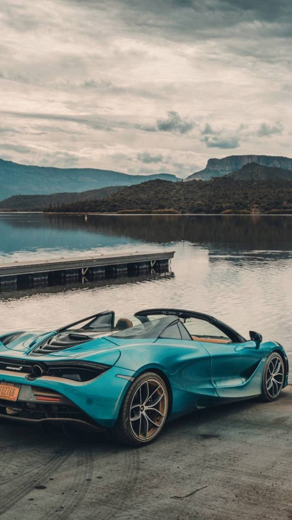  McLaren Hintergrundbild 1000x1778. Download McLaren 720S Blue Car By Lake Phone Wallpaper